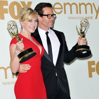 Kate Winslet, Guy Pearce in The 63rd Primetime Emmy Awards - Press Room