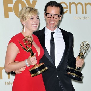 Kate Winslet, Guy Pearce in The 63rd Primetime Emmy Awards - Press Room