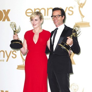 Kate Winslet, Guy Pearce in The 63rd Primetime Emmy Awards - Press Room