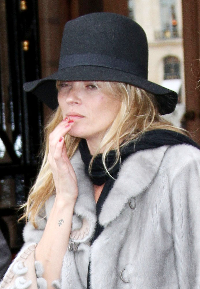 British supermodel Kate Moss is planning to design her own wedding dress 