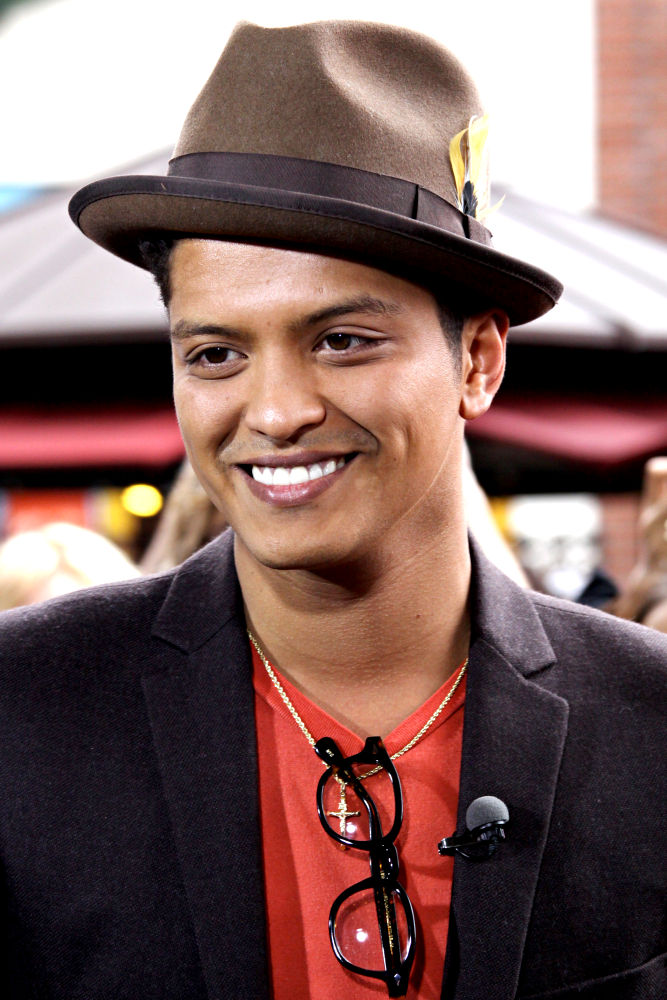R&B star Bruno Mars is "embarrassed" by his recent arrest for cocaine 