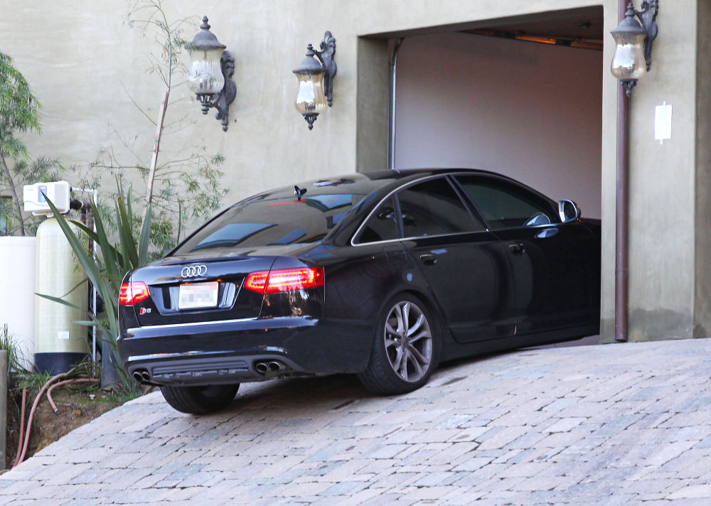 Zac Efron in Zac Efron Leaving Vanessa Hudgens' House in His Car Zac Efron in Zac Efron Leaving Vanessa Hudgens' House in His Car