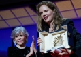 Cheeky Jane Fonda Hurls Palme d'Or Scroll at Director Justine Triet's Back at Cannes