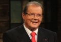 Roger Moore's Son Slams 'Ridiculous' Suggestion That James Bond Is Played by American 