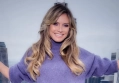 Heidi Klum Barely Covers Chest With Fur Coat in New Video