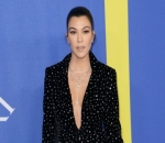 Kourtney Kardashian Goes Daring