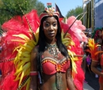 The revelers ride on brightly decorated floats