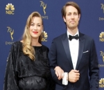 Mom-to-Be on Gold Carpet