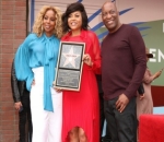 Proudly Posing With the Star