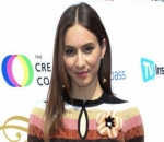 Troian Bellisario Recalls Giving Birth to Newborn Daughter Inside Her Car in Hospital Parking Lot
