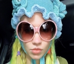 Grimes Teases She's 'One Step Closer' to Ink Her Face After Debuting New Leg and Ear Tattoos