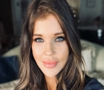 Donna D'Errico Reshares Racy Photo After Blasting Haters Over Her Removed Pics 