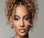 DaniLeigh Adopts Resilience With New Broken Sword Tattoo