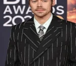 Harry Styles Stuns in Chanel Pinstripes and Ballet Flats at 2026 Brits