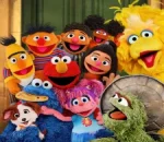 Miley Cyrus Shares Sweet Moment with Cookie Monster on Sesame Street