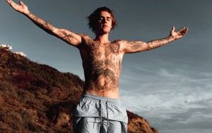 Justin Bieber Cozies Up to New Girl Aboard a Yacht