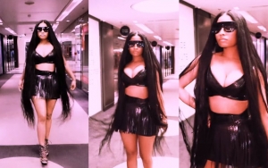 Nicki Minaj Flaunts Stunning Figure in 'Chun-Li' Selfie Music Video