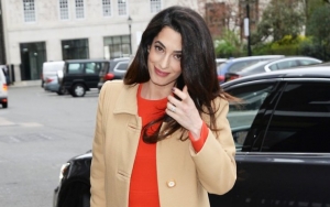 Amal Clooney Is Red Hot in Lacey Corset
