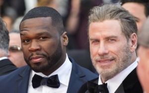 John Travolta Responds to Viral Dance Moves With 50 Cent at Cannes: It's the Least I Can Do
