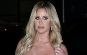 Kim Zolciak Flashes Her Butt in Barely-There Thong Bikini