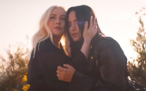 Christina Aguilera and Demi Lovato Liberate Themselves in 'Fall in Line' Music Video