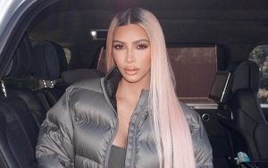 Kim Kardashian Goes Back to Platinum Blonde for Wedding Anniversary