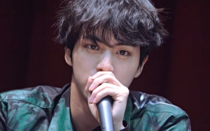 Fans Swoon Over BTS' Jin's Killer Gaze at Signing Event