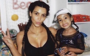 Kim Kardashian Criticized for Straightening North West's Curly Hair
