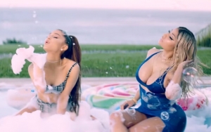 Nicki Minaj and Ariana Grande Have Fun in the Pool in Steamy Teaser for 'Bed' Music Video
