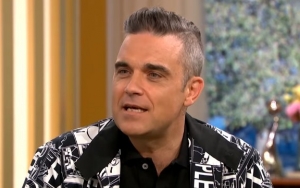 Robbie Williams 'Can't Trust' Himself After Flipping the Bird at World Cup Ceremony