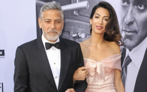 George and Amal Clooney Donate $100K to Support Migrant Families