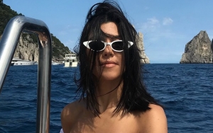 Kourtney Kardashian Risks Nip Slip as She Goes Braless in Daring Dress
