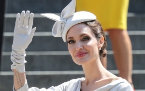 Angelina Jolie Copies Meghan Markle's Style at Royal Service