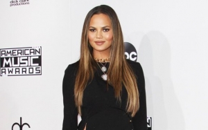Chrissy Teigen Calls Out Man for Taking Picture of Her Pumping Breasts