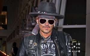 Johnny Depp Settles Bitter Lawsuit With Ex-Managers