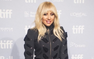 Lady GaGa Flaunts Her Butt, Gets Dunked by Waves During Lingerie Photo Shoot on Beach