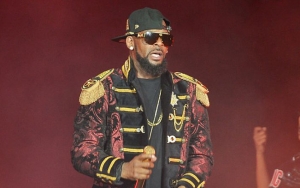 Arrest Warrant Issued for R. Kelly's Manager Over Death Threats to Sex Cult Accuser