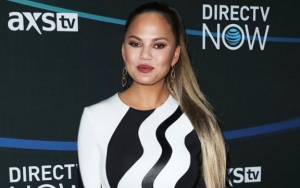 Chrissy Teigen Hits Back at Troll Over Her Family Vacation in Bali