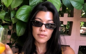 Kourtney Kardashian Hits the Beach With Her Kids and Mystery Guy After Younes Bendjima Split