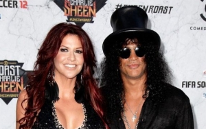 Slash Offers to Help Estranged Wife Catch Internet Troll to Finalize Divorce