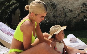 Kylie Jenner Flaunts Hot Body in Neon Bikini While Hanging Out With Stormi in New Pics