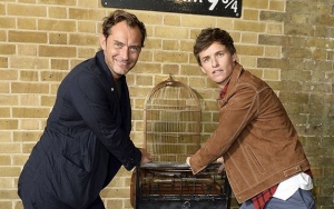 Eddie Redmayne and Jude Law Pay Surprise Visit to Platform 9 3/4 at King's Cross Station