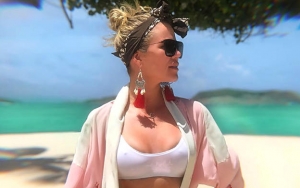 Khloe Kardashian Claps Back at Trolls Who Accuse Her of Photoshopping Post-Baby Bikini Pic