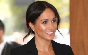 Meghan Markle Allegedly Picks Up Her Dog's Poop at Kensington Palace