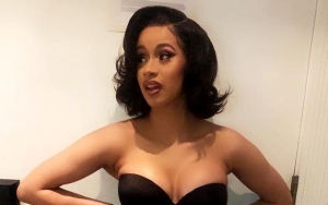Cardi B Steps Out in Bathrobe After Ranting About Her Sagging Breasts