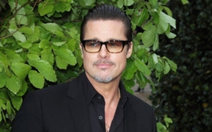 Dating Again? Brad Pitt Spotted With Jewelry Designer at Charity Auction