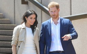 Protective Wife Meghan Markle Shields Prince Harry From Rain During Australian Visit