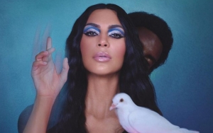 Completely Topless Kim Kardashian Cozies Up to Male Model in New Picture