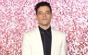 Rami Malek Gives Gold Treatment to His Fake Freddie Mercury Teeth