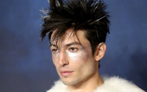 Pics: Ezra Miller Casts Deadly Spell at 'Fantastic Beasts: The Crimes of Grindelwald' U.K. Premiere